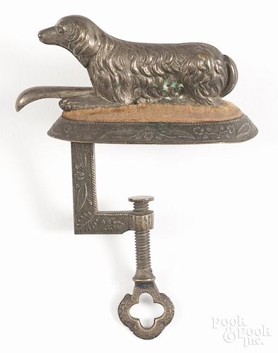 Unusual tin recumbent dog sewing bird pincushion, 19th c., 3 1/2'' l.