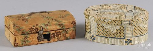Two wallpaper boxes, 19th c., one is a pine dome top box with fabric covering, 8'' w.