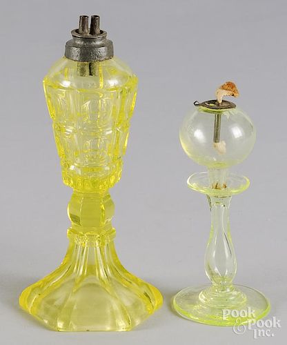 Two Vaseline glass fluid lamps, 19th c., 9'' h. and 6 1/2'' h.