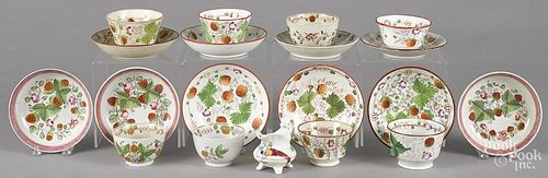 Fourteen Queens rose strawberry pearlware cups and saucers, 19th c., together with two extra saucers