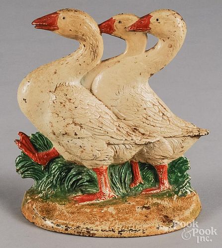 Cast iron three geese doorstop, early 20th c., 8 1/2'' h.