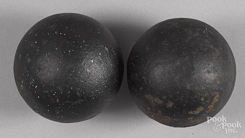Two cast iron cannon balls, 3'' dia.