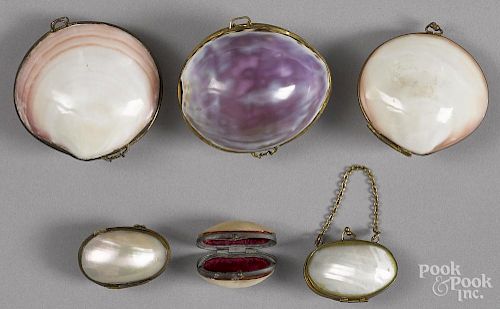 Six sea shell coin purse pill boxes, 19th c., largest - 3'' w.