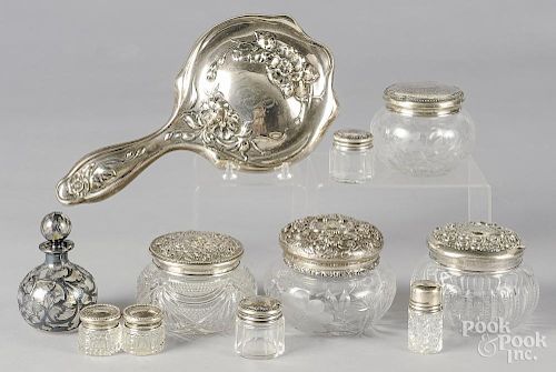 Sterling silver dresser items, 19th/20th c., to include four sterling lidded powder jars
