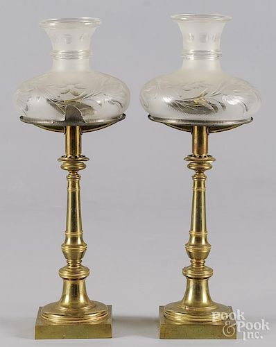 Pair of brass astral lamps, 19th c., with etched glass shades, overall - 16'' h.