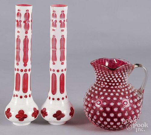 Pair of Czechoslovakian cut ruby and opalescent lamp chimneys, 19th c., 15 1/4'' h.