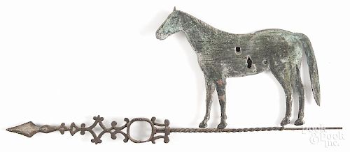 Swell-bodied copper horse weathervane, 19th c., with a cast iron directional arrow, 24'' l.