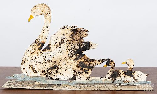 Painted sheet iron swan with young, 11 1/4'' h., 19 1/2'' w.