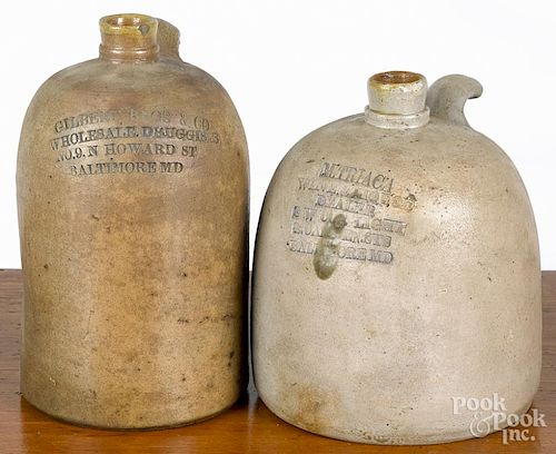 Two Baltimore, Maryland stoneware jugs, 19th c., one stamped Gilbert Bros & Co. Wholesale Druggists