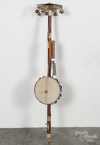 One man band instrument, 20th c., 50'' h.