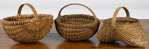 Three splint gathering baskets, 19th c., including one buttocks and two melon baskets, tallest - 7''.