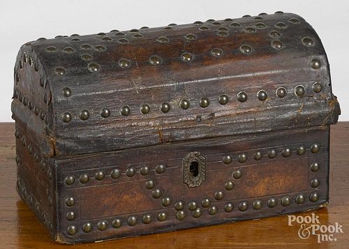 Tacked leather dome lid trinket box, early 19th c., 5 1/4'' h., 8 1/4'' w.