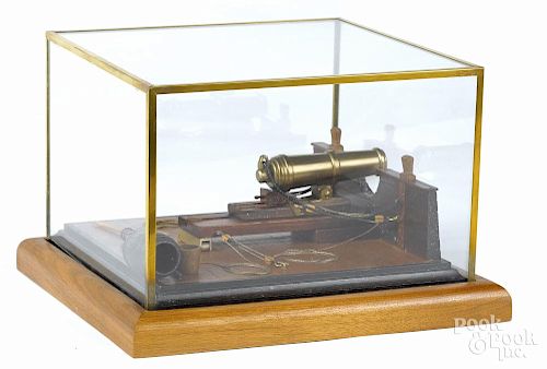 Contemporary diorama with a brass cannon and accoutrements, 7'' h., 8 3/4'' w.