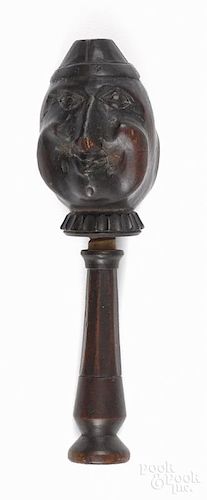 Carved figural nutcracker, ca. 1900, with a double-sided face, 7 1/2'' h.