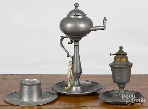 Two Continental pewter fat lamps, 19th c., together with an inkwell, tallest - 10''.