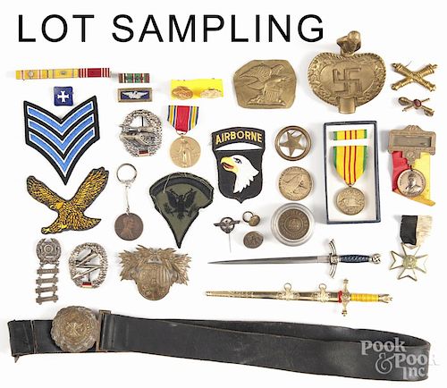 Military medals, pins, and accessories, 19th/20th c., together with a Nazi veteran flag.