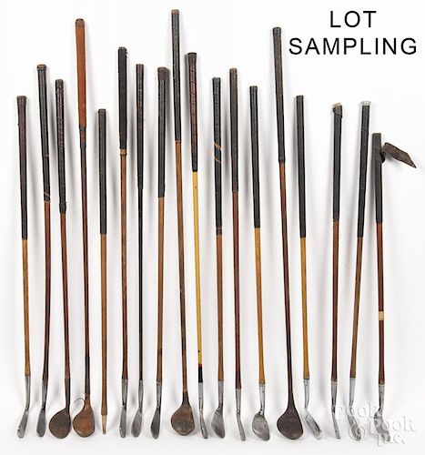 Twenty-eight wood shaft golf clubs, together with two steel handle examples.