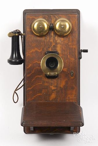 Early Western Electric oak wall hanging telephone, 20 1/2'' h., 9 1/2'' w.