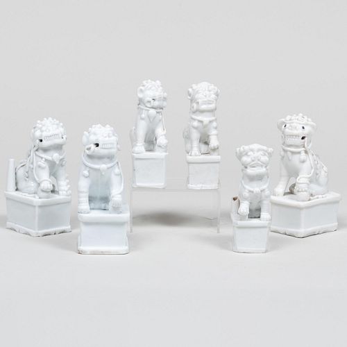 Group of Six Chinese White Glazed Porcelain Buddhistic Lion Joss Stick Holders