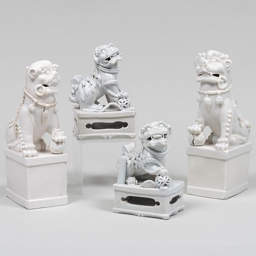 Group of Four Chinese White Glazed Porcelain Buddhist Lion Joss Stick Holders