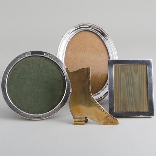 Three Silver Picture Frames and a Brass Model of a Boot