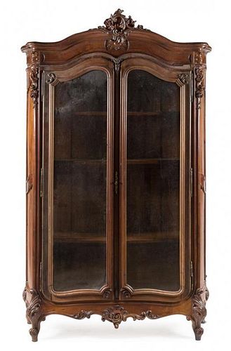 * A Louis XV Style Walnut Armoire Height 97 x width 61 3/4 x depth 19 inches.