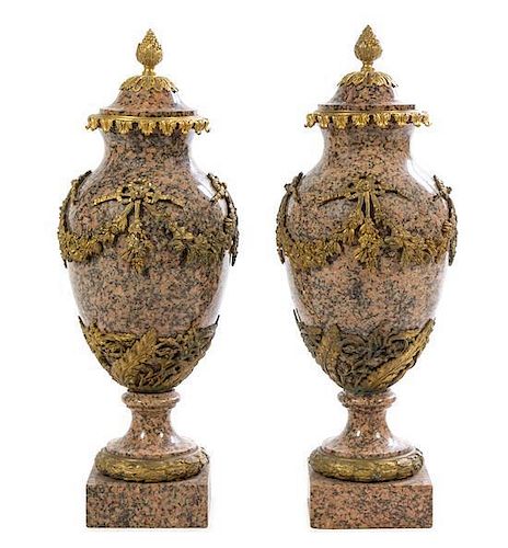 A Pair of Large French Gilt Bronze Mounted Marble Urns Height 29 1/2 inches.