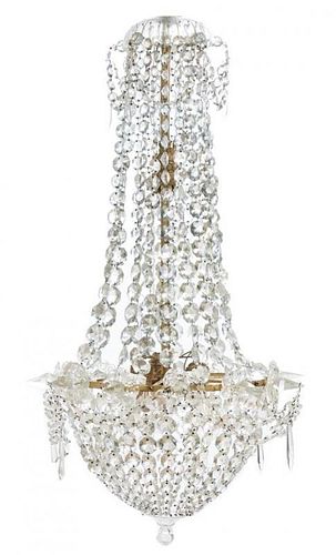 An Empire Gilt Bronze and Glass Chandelier Height 42 inches.