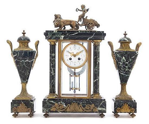 A French Marble and Bronze Clock Garniture Height of clock 20 1/2 inches.