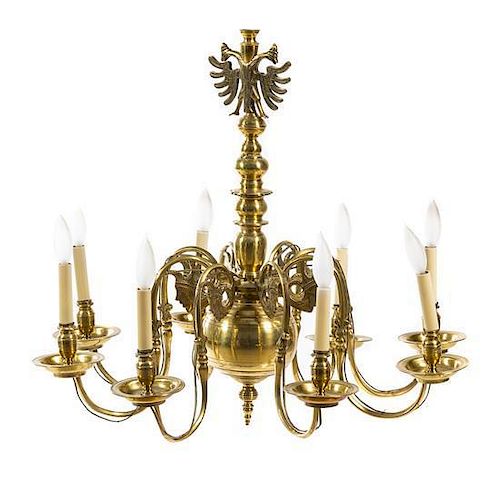 * A Dutch Baroque Style Brass Eight-Light Chandelier Diameter 29 1/2 inches.