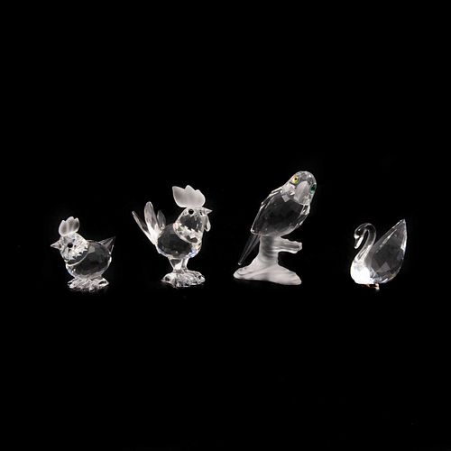 LOTE DE FIGURAS DECORATIVAS. AUSTRIA, SXX.Elaboradas en cristal transparente. De la firma SWAROVSKI. Consta de aves. 4 pz