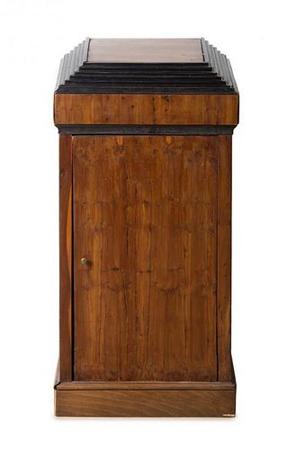 * A Biedermeier Parcel Ebonized Fruitwood Side Cabinet Height 31 3/4 x width 15 3/4 x depth 13 3/4 inches.