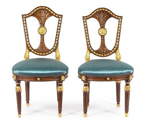 A Pair of Russian Neoclassical Parcel Gilt Mahogany Side Chairs Height 39 1/2 inches.