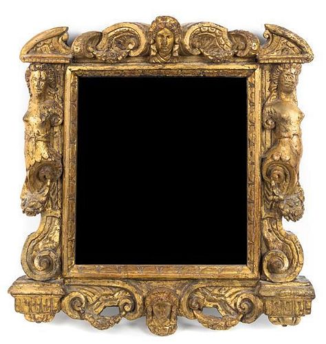 A Continental Carved Giltwood Mirror Height 21 1/2 x width 20 inches.