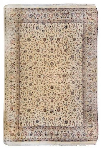 * An Indo-Persian Wool Rug 17 feet x 11 feet