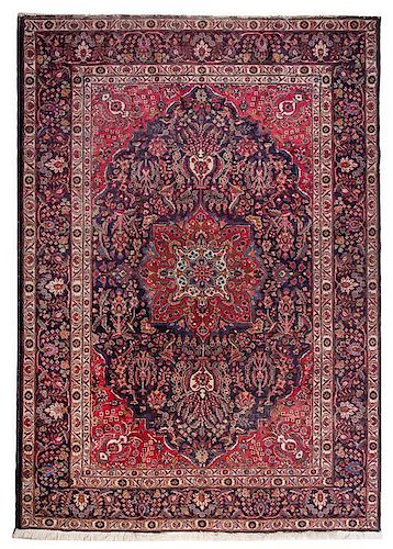 * A Tabriz Wool Rug 9 feet 4 1/2 inches x 6 feet 8 1/4 inches.