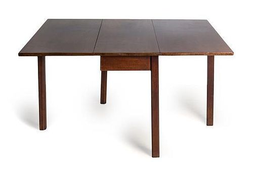 A George III Mahogany Double Drop Leaf Table Height 27 1/4 x width 41 1/4 x depth 17 inches (closed).