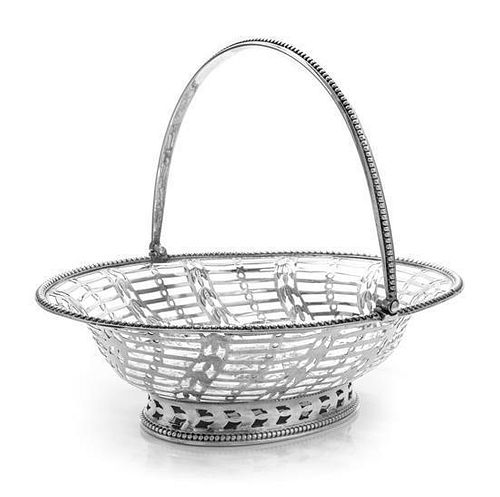 A George III Silver Reticulated Sweetmeat Basket, Hester Bateman, London, 1780, of oval form with a beaded edge and a swing hand