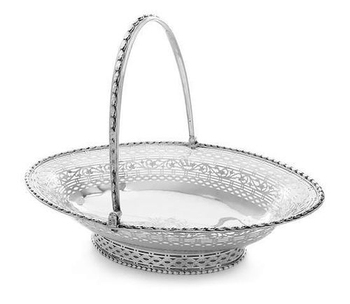 * A George III Silver Basket, Charles Aldridge & Henry Green, London, 1778, of oval form, the body and foot with wreath and vine