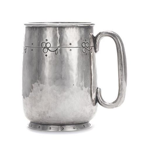 A George V Silver Mug, Liberty & Co., Birmingham, 1914, in the Arts & Crafts taste, with spot-hammered surfaces and stylized cha