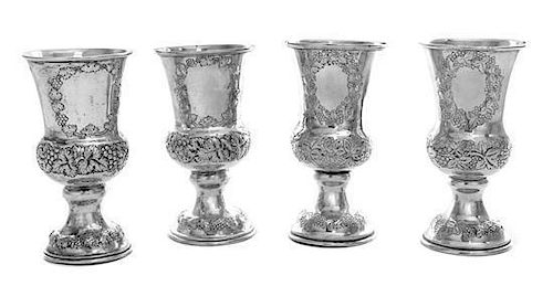 A Set of Four Austrian Silver Wine Goblets, Maker's Mark AK, Vienna, 1865/6, each having grape cluster and vine decorated bandin
