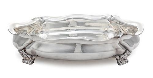 A German Silver Center Bowl, , of oval form, raised on four feet.