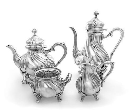 A German Silver Four Piece Tea and Coffee Service, Gebruder Kuhn, Scwabisch Gmund,, each of baluster form with twist decoration
