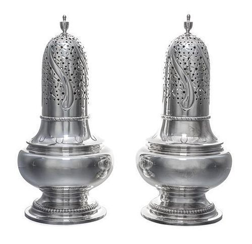 A Pair of American Silver Muffineers, Tiffany & Co., New York, NY, each of baluster form with an urn finial.