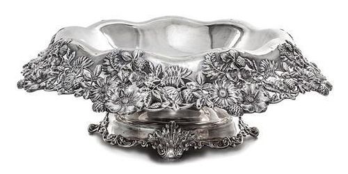 * An American Silver Centerpiece Bowl, Graff, Washbourn & Dunn, New York, NY, the rim worked with floral and foliate elements on