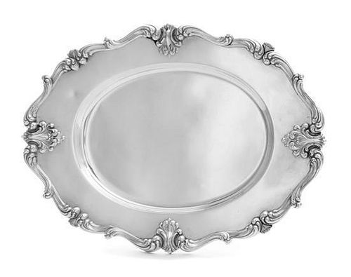 * An American Silver Serving Tray, Frank M. Whiting & Co., North Attleboro, MA, having an S-scroll and foliate motif decorated r