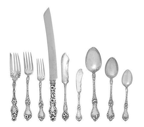 An American Silver Flatware Service, Reed and Barton, Taunton, MA, Les Cinq Fleurs pattern, comprising: 8 dinner knives 6 lunche