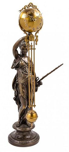 A Cast Metal Figural Pendulum Clock Height 28 inches.