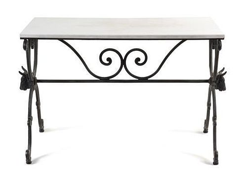 * A Wrought Iron and Marble Table Height 30 x width 52 x depth 24 inches.