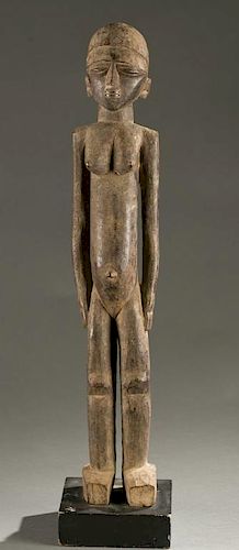 Lobi standing female figure, 20th century.